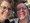 Ein Selfie einer Frau mit Brille und eines Mannes vor einem Imbisswagen. Im Hintergrund ist deutlich der Schriftzug „Gebrauchte Früchte“ auf dem Fahrzeug zu erkennen.